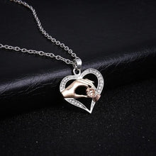 Load image into Gallery viewer, Silver "Mother and Child Hand In Hand" Pendant Necklace
